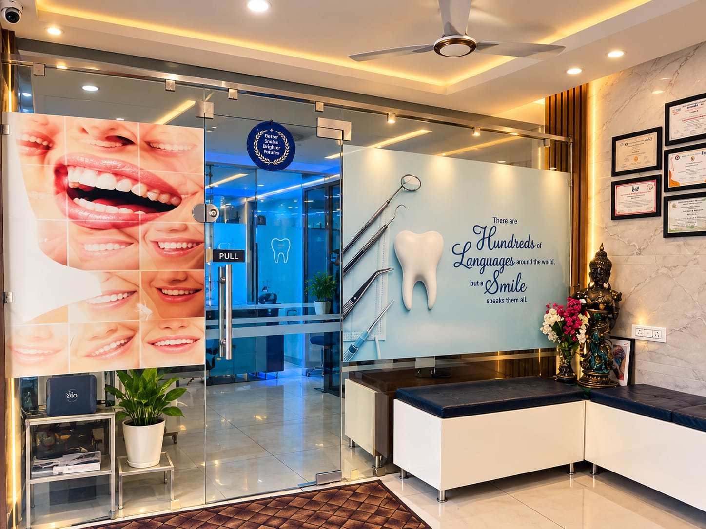 Glass entrance and warmly lit reception area at Smile Suite Dental Clinic